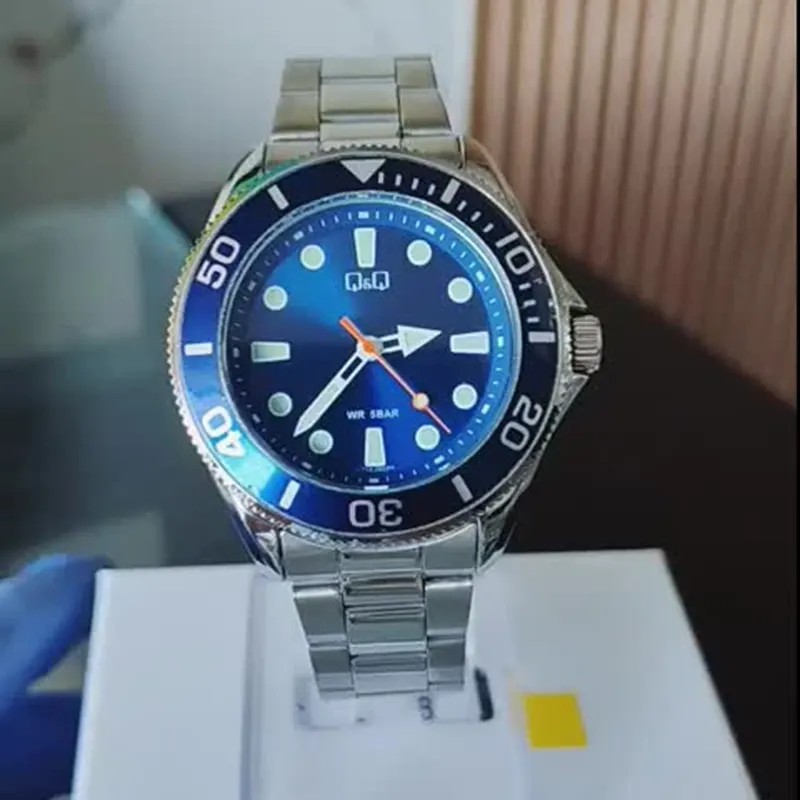 Q&Q Japan Quartz Blue Dial Silver-tone Men's Watch- C72A-002PY